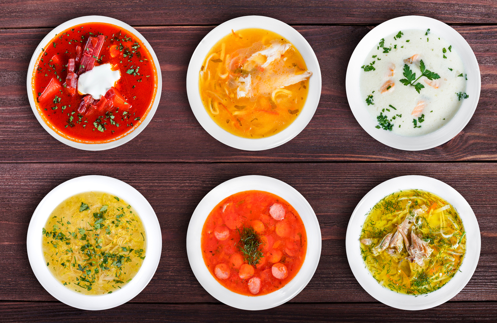 Picture of a variety of 6 different gazpacho soups.